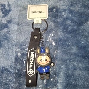 Black Key Holder with Blue Character